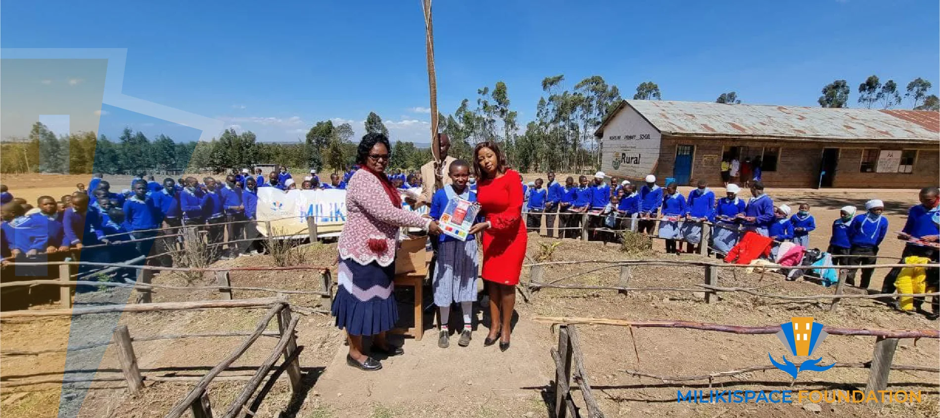 School supplies being presented to children through a MilikiSpace Foundation initiative