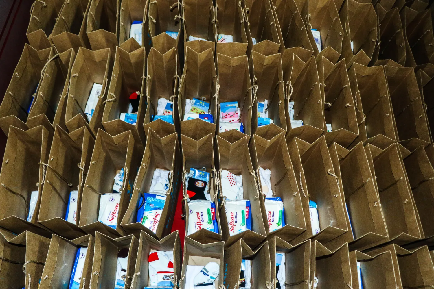 Rows of packed MilikiSpace gift bags ready for delivery