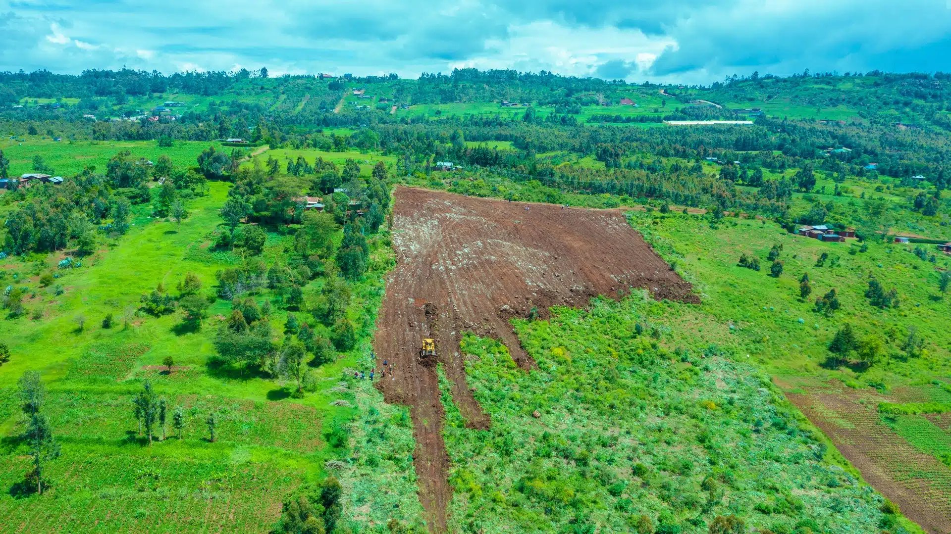 Drone view over a MilikiSpace land project in a green growth corridor